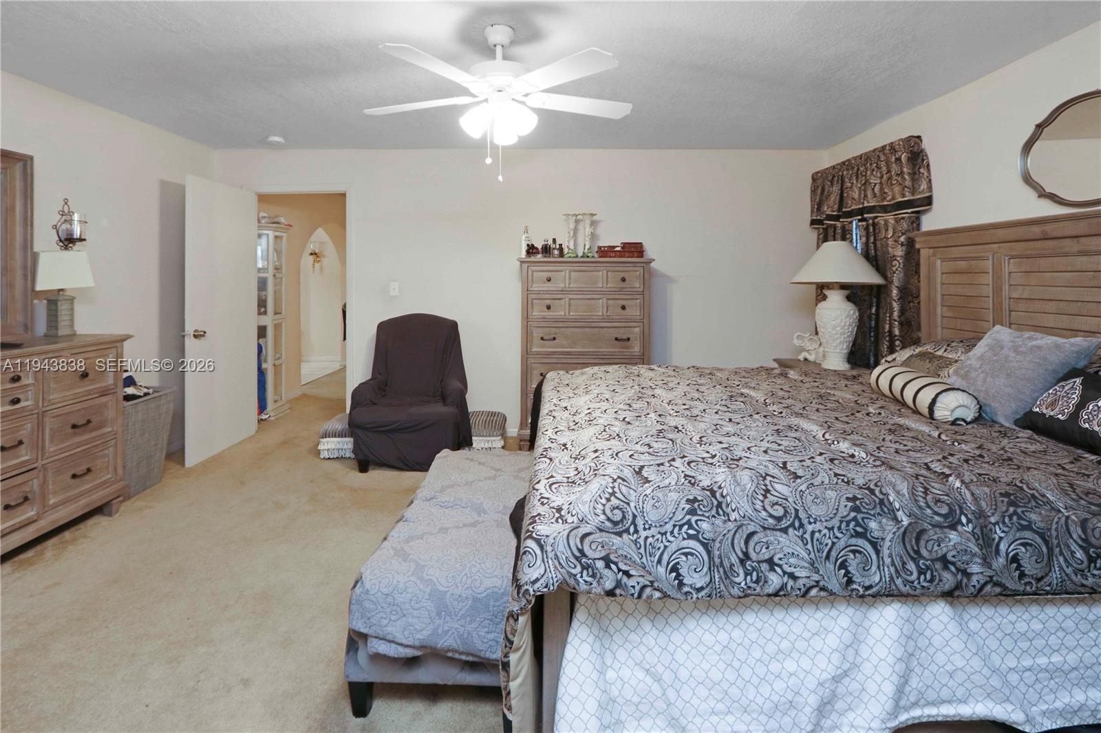 13243 Southwest 258th Terrace Homestead, FL 33032 - Photo 14 of 25 a bedroom with a bed and furniture
