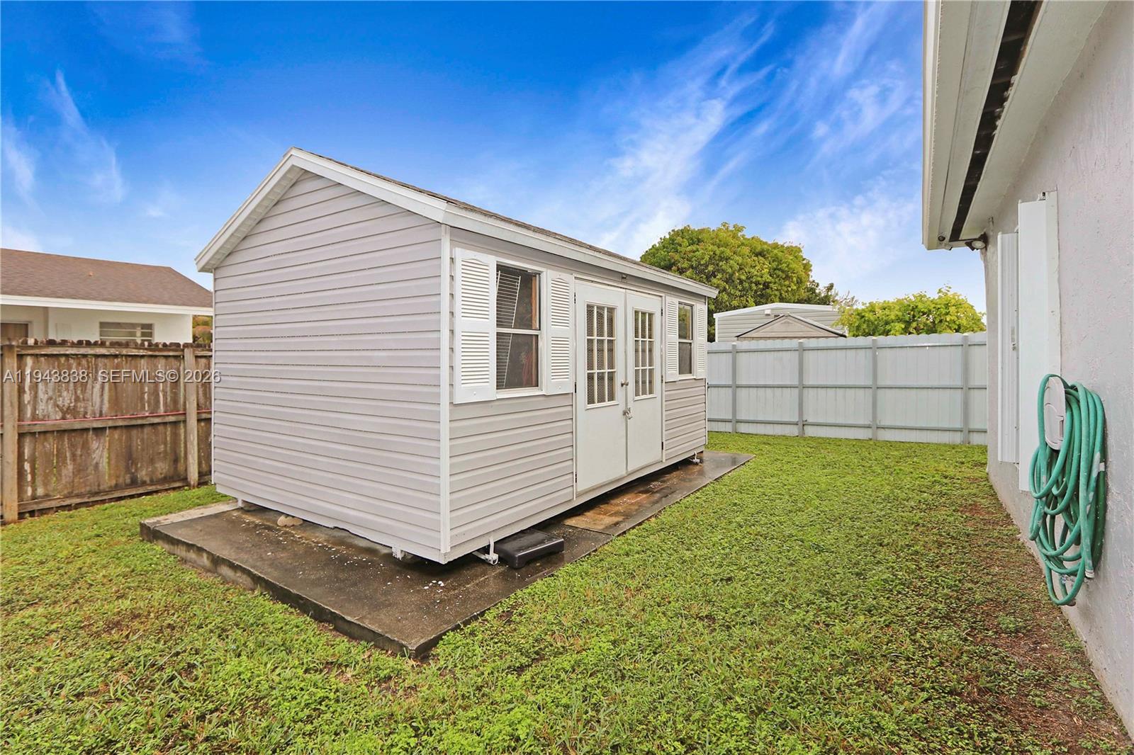 13243 Southwest 258th Terrace Homestead, FL 33032 - Photo 24 of 25 a view of a backyard