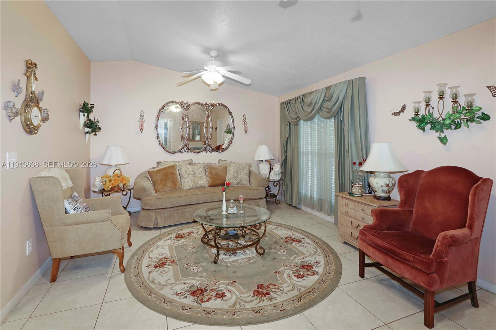 13243 Southwest 258th Terrace Homestead, FL 33032 - Photo 5 of 25 a living room with furniture flowerpot and wooden floor
