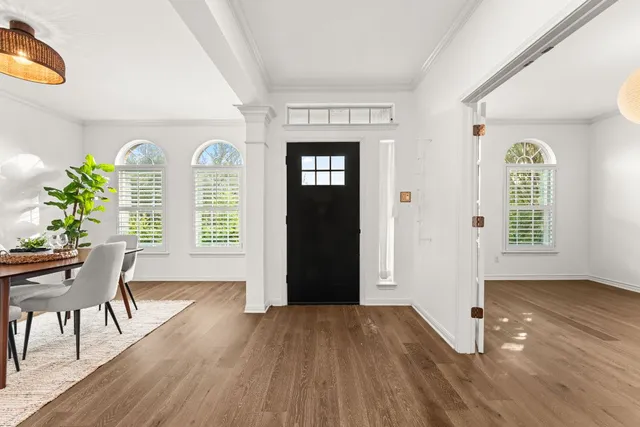 a view of livingroom with furniture window and wooden floor