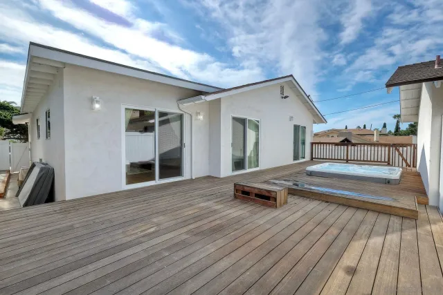 a roof deck view with a seating space