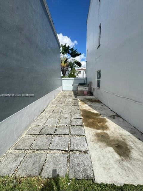 12100 Southwest 271st Street, Unit 12100 Homestead, FL 33032 - Photo 23 of 24 a bathroom with a sink