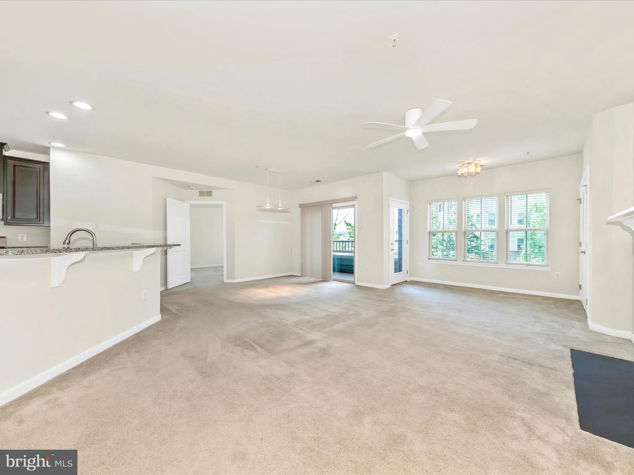 6501 Walcott Lane, Unit 202 Frederick, MD 21703 - Photo 19 of 53 a view of an empty room with a window