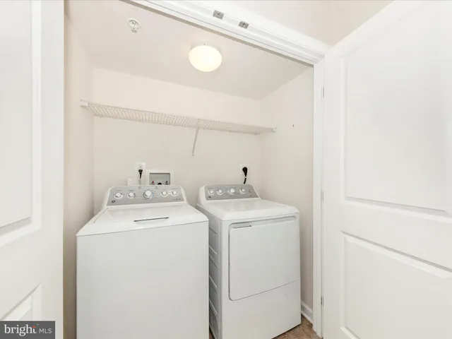 a living room with furniture and a area