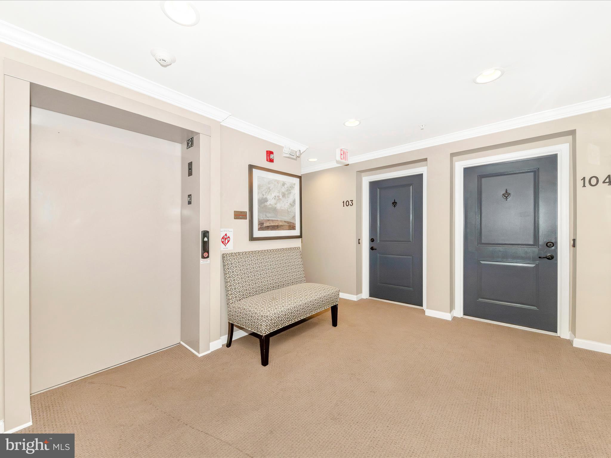 6501 Walcott Lane, Unit 202 Frederick, MD 21703 - Photo 38 of 53 a living room with furniture and a area