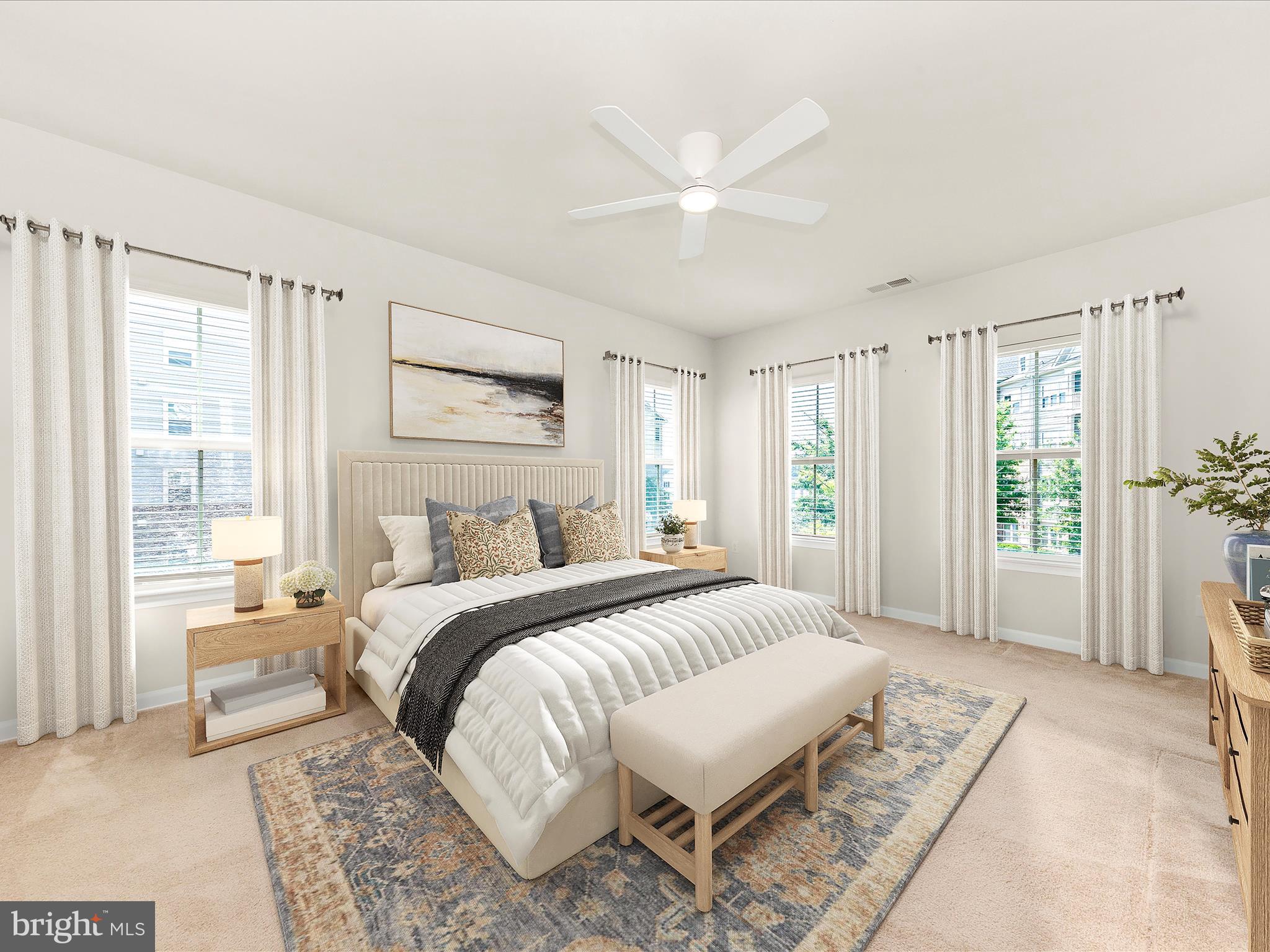 6501 Walcott Lane, Unit 202 Frederick, MD 21703 - Photo 6 of 53 a spacious bedroom with a large bed and a window