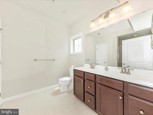 a view of a balcony with chairs