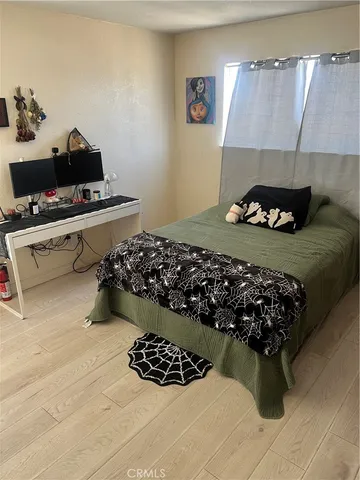 a bed room with a bed and a couch