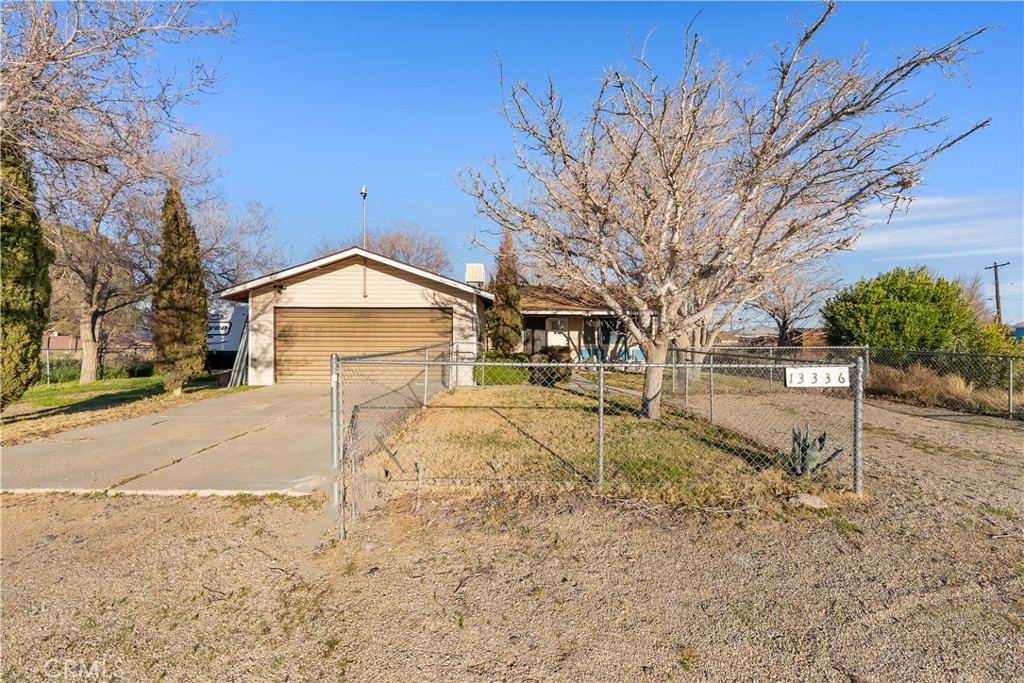 13336 Clement Edwards, CA 93523 - Photo 1 of 56 a view of large house with a yard covered in the road