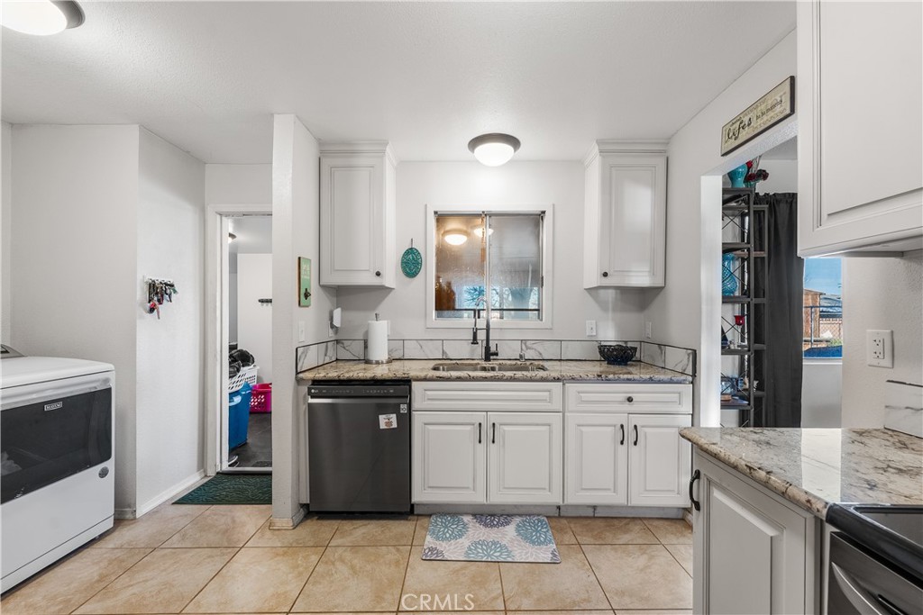 13336 Clement Edwards, CA 93523 - Photo 19 of 56 a kitchen with a stove top oven and sink