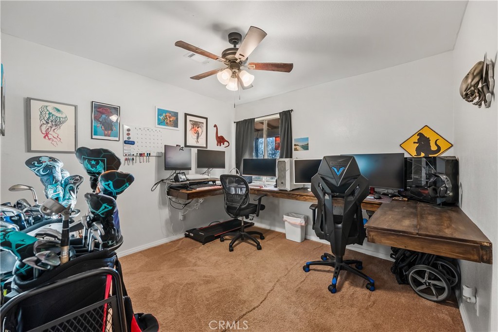 13336 Clement Edwards, CA 93523 - Photo 20 of 56 a view of a workspace with furniture and gym equipment