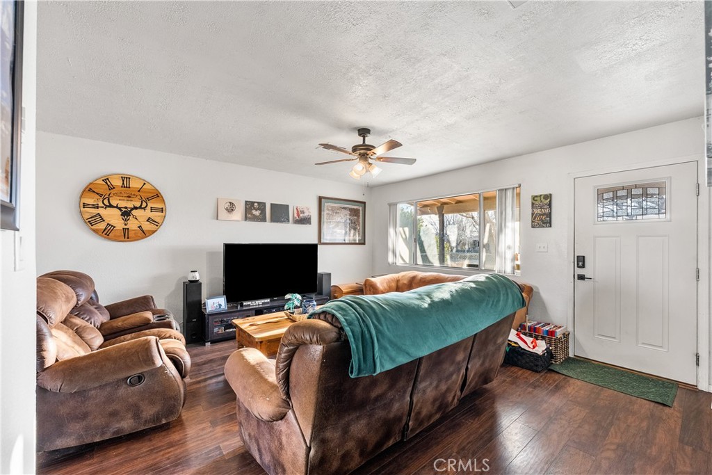 13336 Clement Edwards, CA 93523 - Photo 3 of 56 a living room with furniture and a flat screen tv