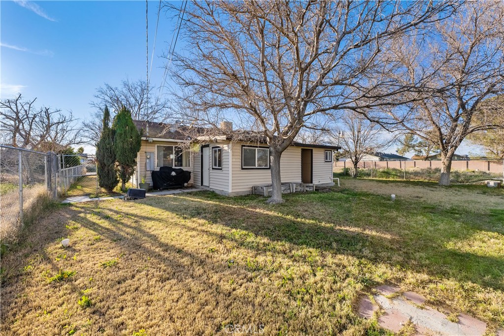 13336 Clement Edwards, CA 93523 - Photo 35 of 56 a view of a yard with a large tree