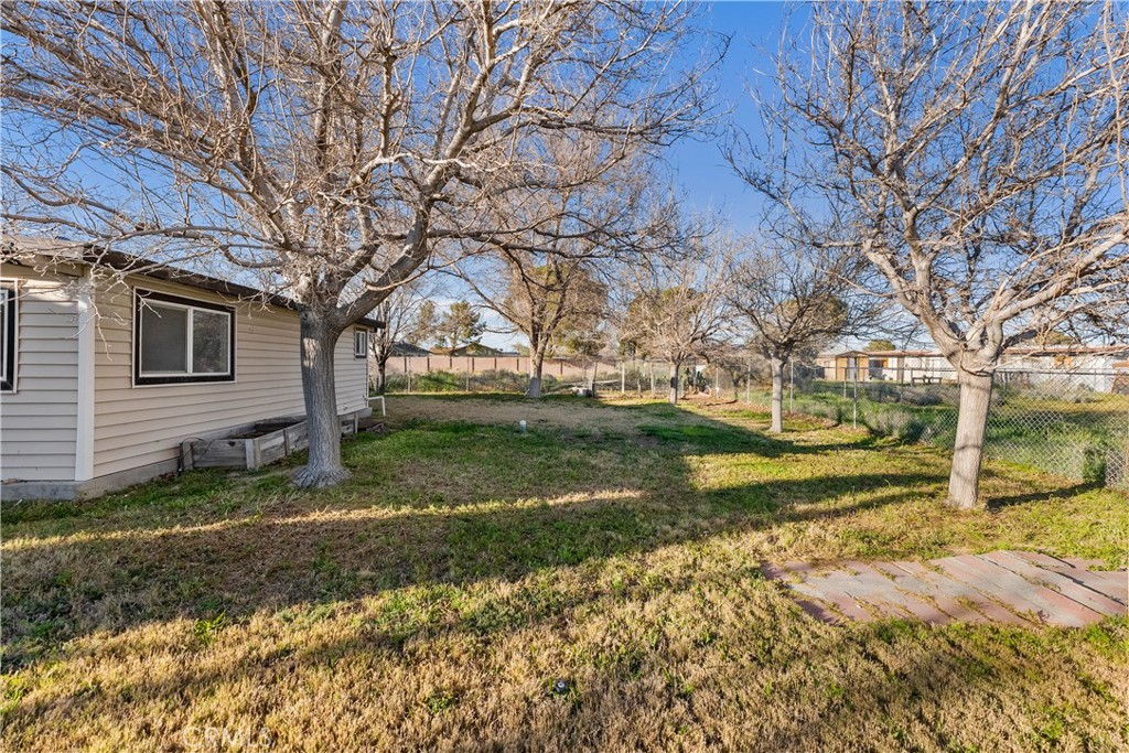 13336 Clement Edwards, CA 93523 - Photo 36 of 56 a view of a house with a yard