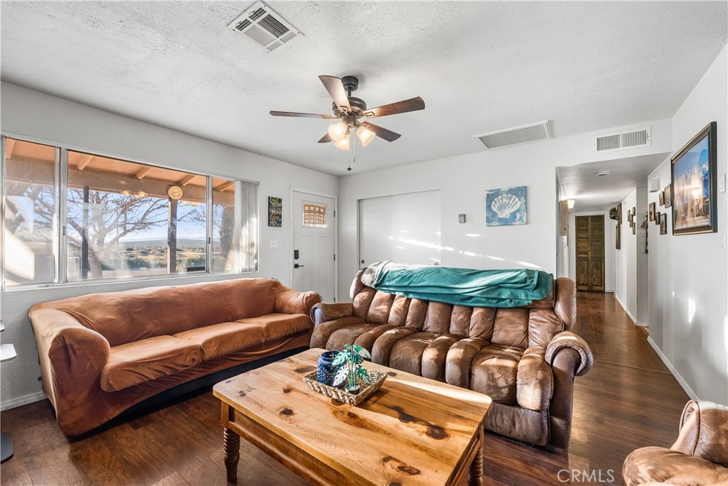 13336 Clement Edwards, CA 93523 - Photo 5 of 56 a living room with furniture and a large window