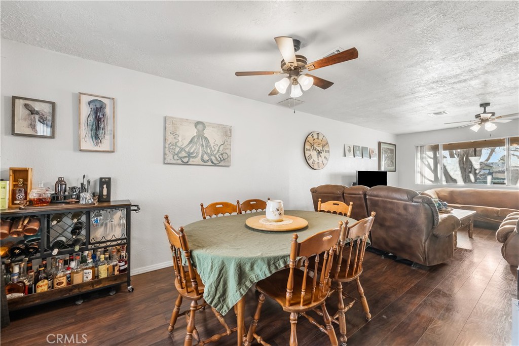 13336 Clement Edwards, CA 93523 - Photo 10 of 56 a view of a dining room with furniture and wooden floor