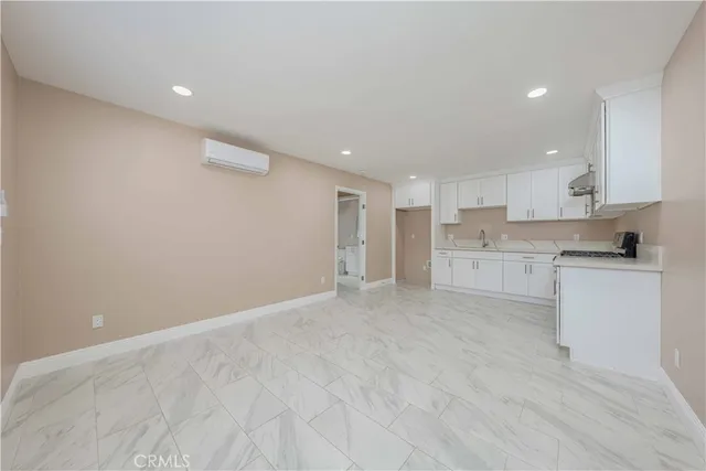 a view of kitchen with wooden floor