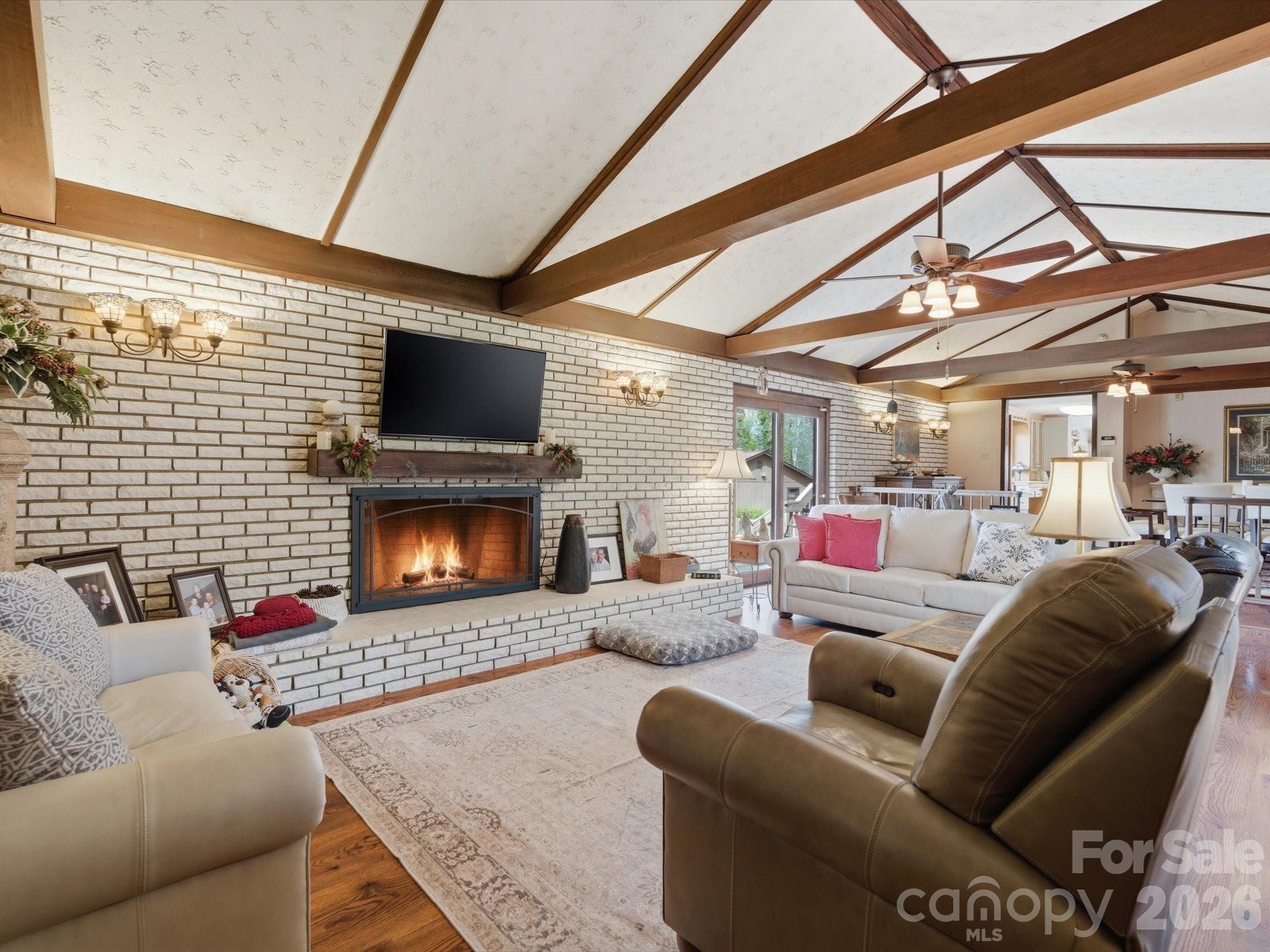 2620 Reeves Island Road Gold Hill, NC 28071 - Photo 20 of 48 a living room with furniture and a fireplace