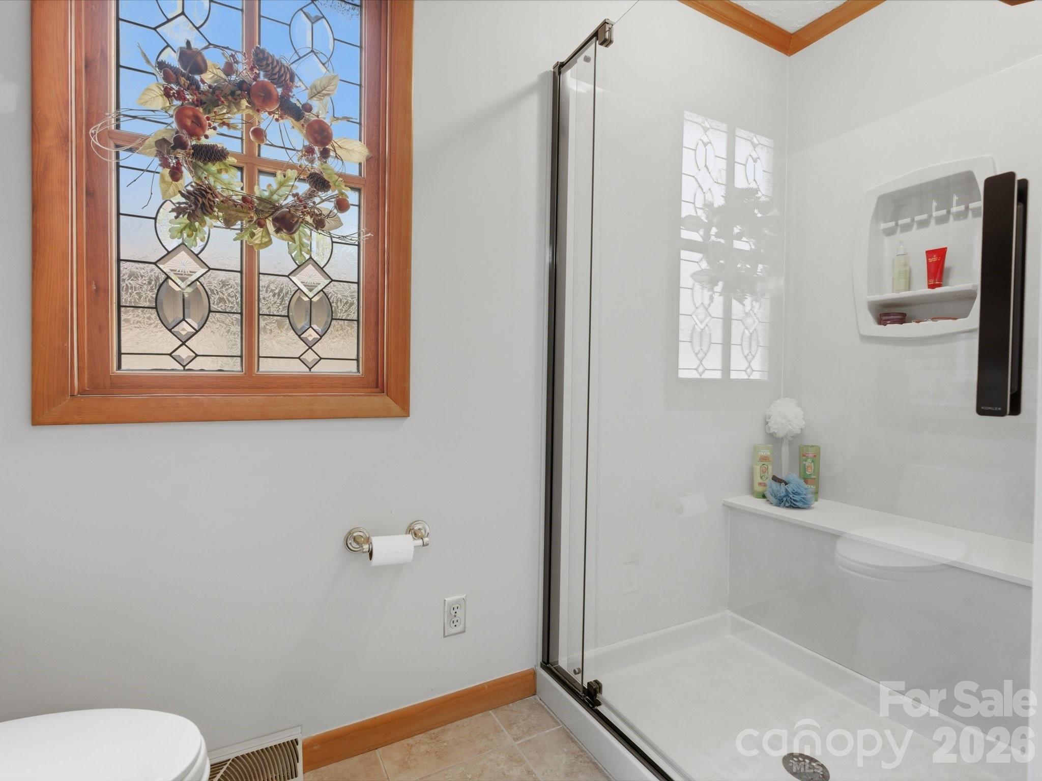 2620 Reeves Island Road Gold Hill, NC 28071 - Photo 26 of 48 a bathroom with a toilet and a shower