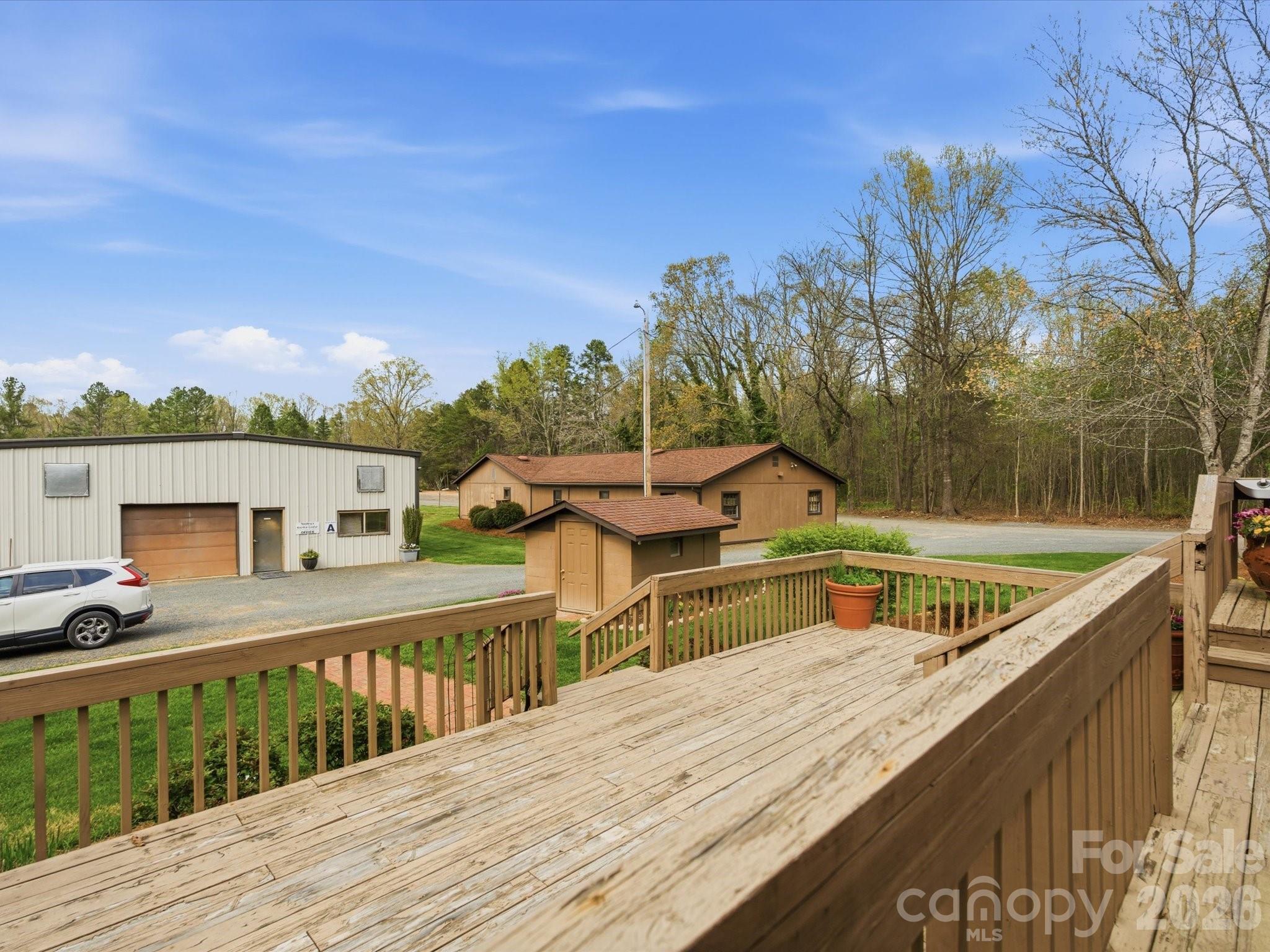 2620 Reeves Island Road Gold Hill, NC 28071 - Photo 34 of 48 a view of house with roof deck and seating space