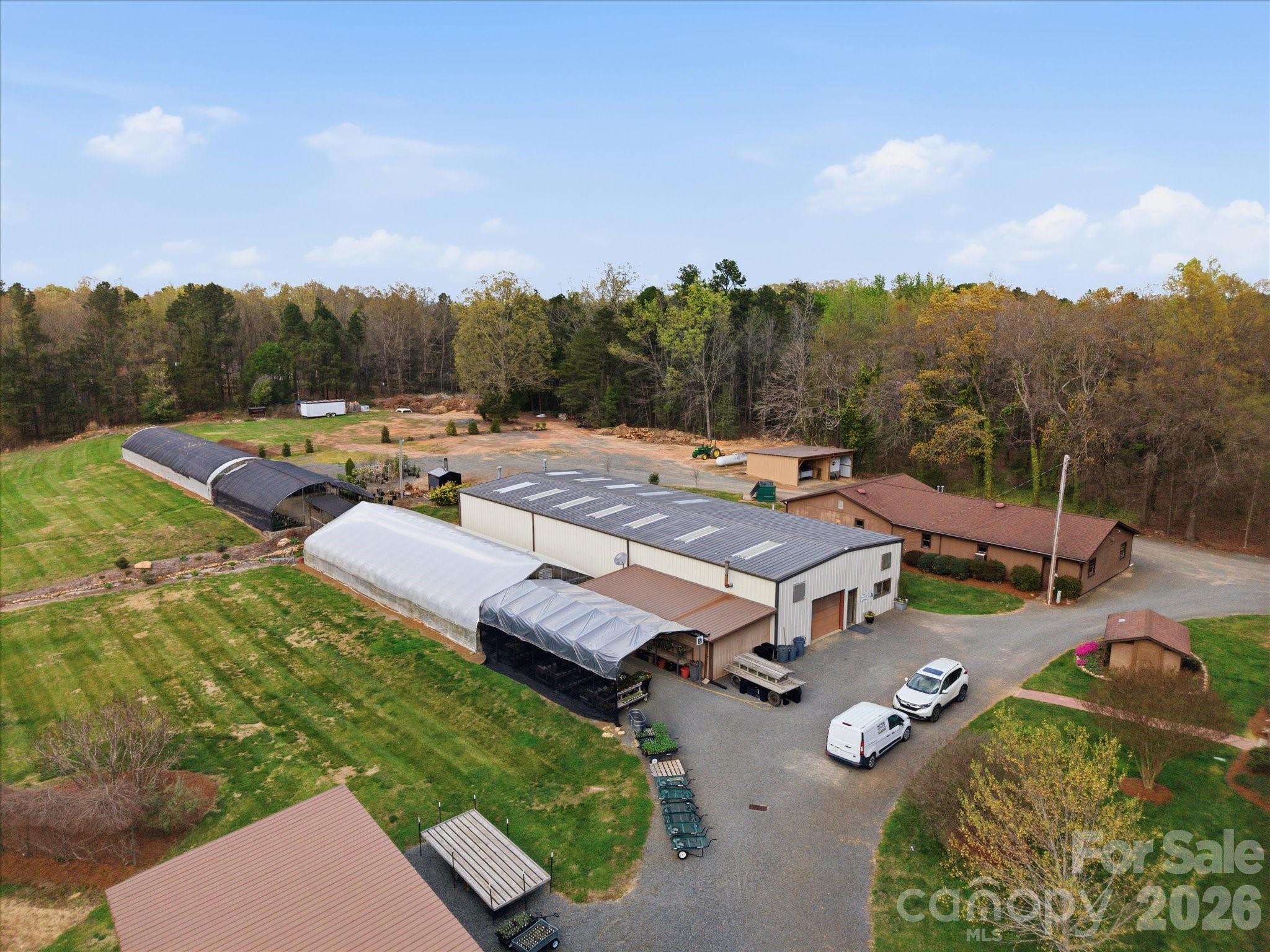 2620 Reeves Island Road Gold Hill, NC 28071 - Photo 46 of 48 an aerial view of a house with garden space and street view