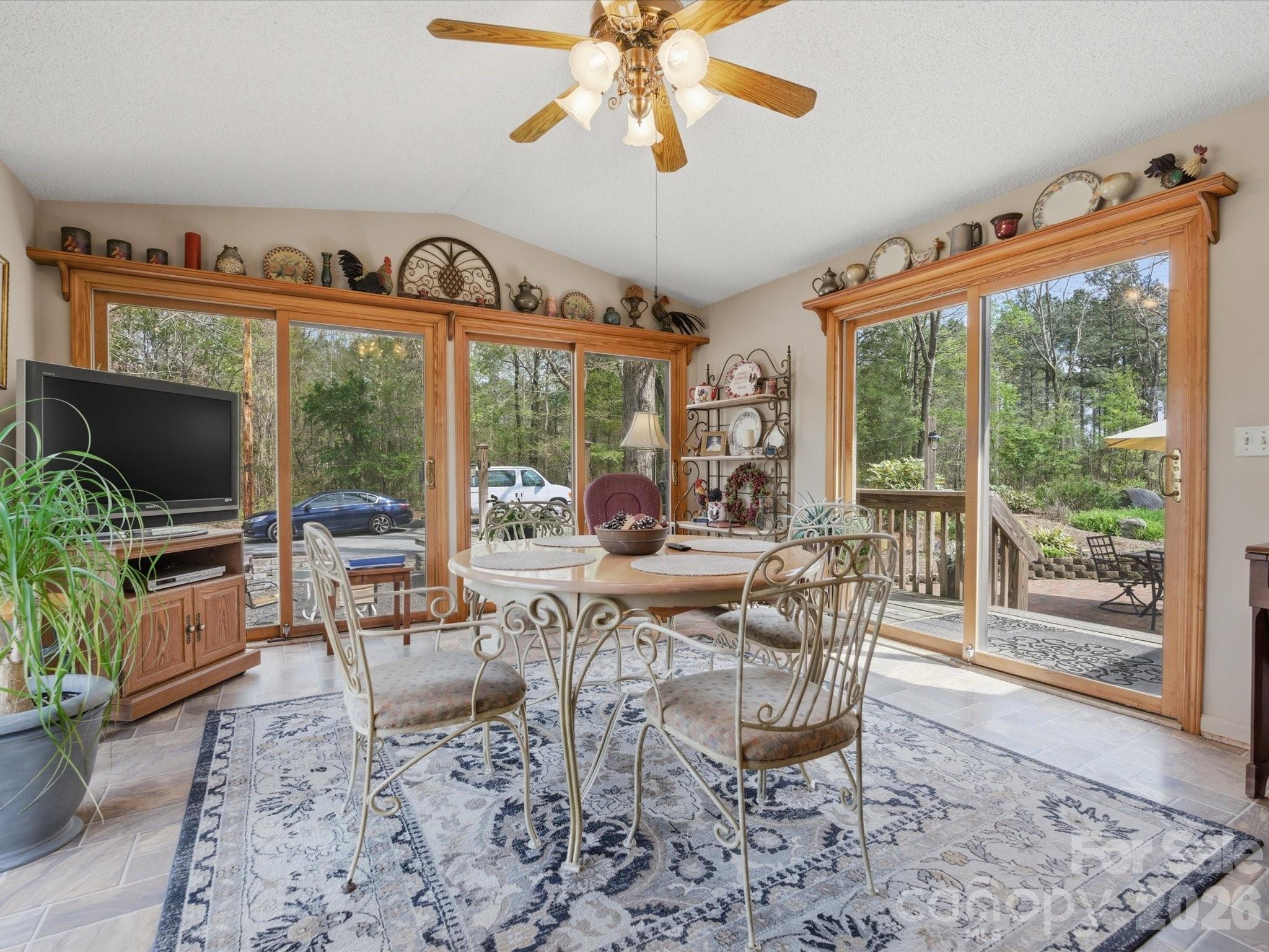 2620 Reeves Island Road Gold Hill, NC 28071 - Photo 10 of 48 a living room with fireplace furniture and a flat screen tv