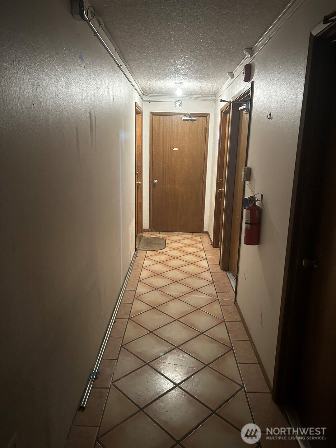 13717 32nd Avenue Northeast Seattle, WA 98125 - Photo 5 of 5 a bathroom with a sink and mirror