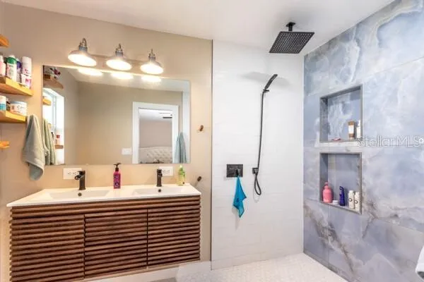 a bathroom with a sink and a mirror