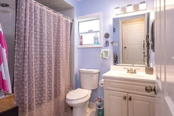 a workspace with furniture and a window