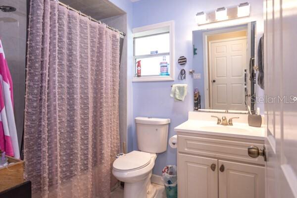 504 North Cherry Street Bunnell, FL 32110 - Photo 24 of 40 a bathroom with a sink toilet and shower