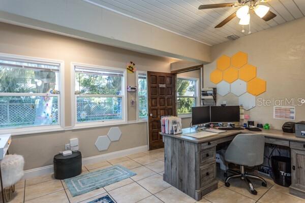 504 North Cherry Street Bunnell, FL 32110 - Photo 26 of 40 a workspace with furniture and a window