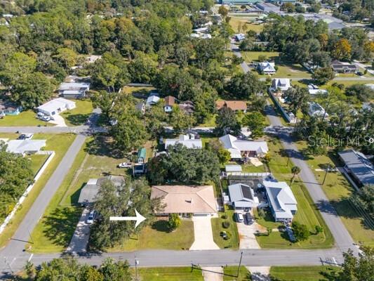 504 North Cherry Street Bunnell, FL 32110 - Photo 27 of 40 an aerial view of residential houses with outdoor space