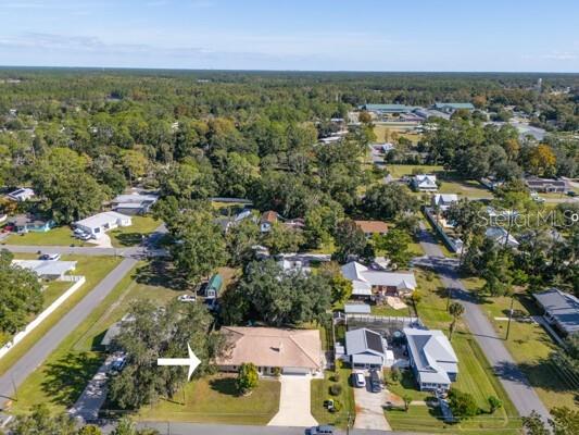 504 North Cherry Street Bunnell, FL 32110 - Photo 31 of 40 an aerial view of residential houses with outdoor space