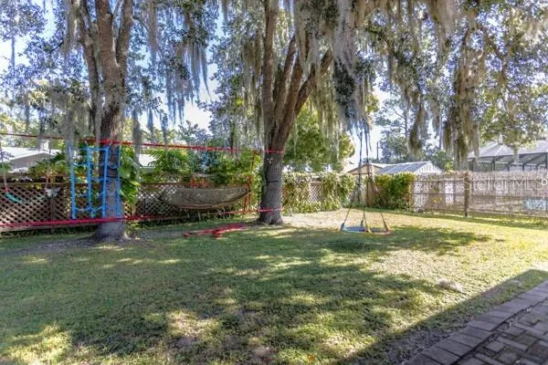 a view of a backyard with a slide