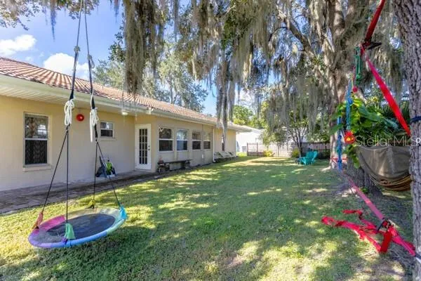 a living room with furniture and decor