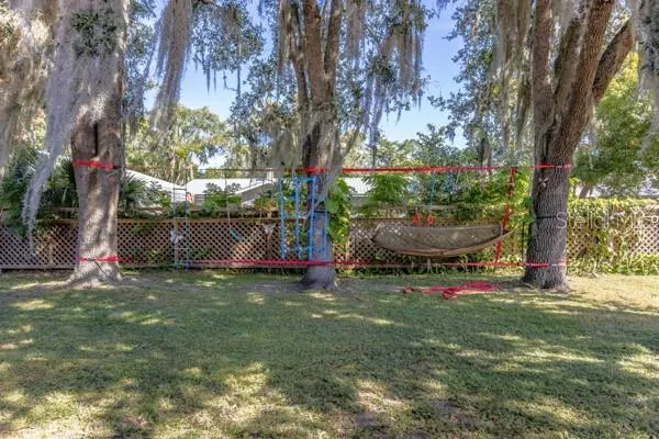 a bedroom with furniture and white walls