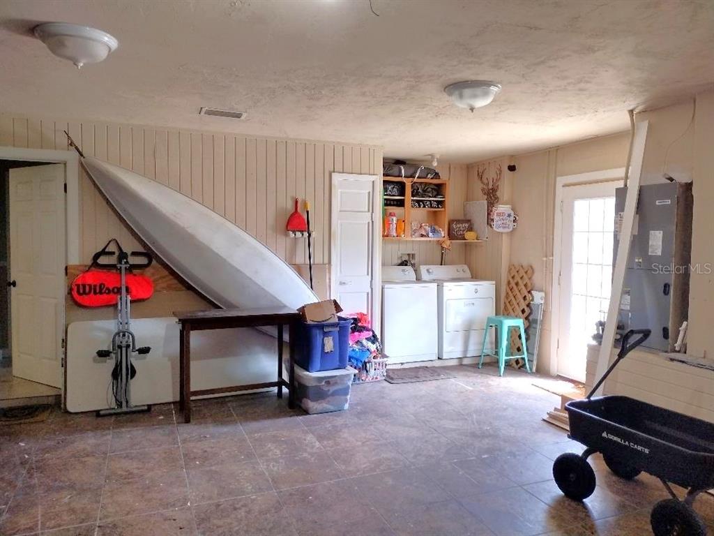 504 North Cherry Street Bunnell, FL 32110 - Photo 39 of 40 a bedroom with furniture and white walls