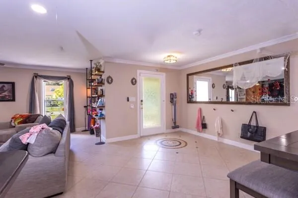 a living room with furniture and a window