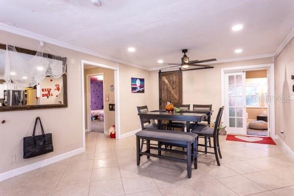 504 North Cherry Street Bunnell, FL 32110 - Photo 9 of 40 a dining room with furniture and window