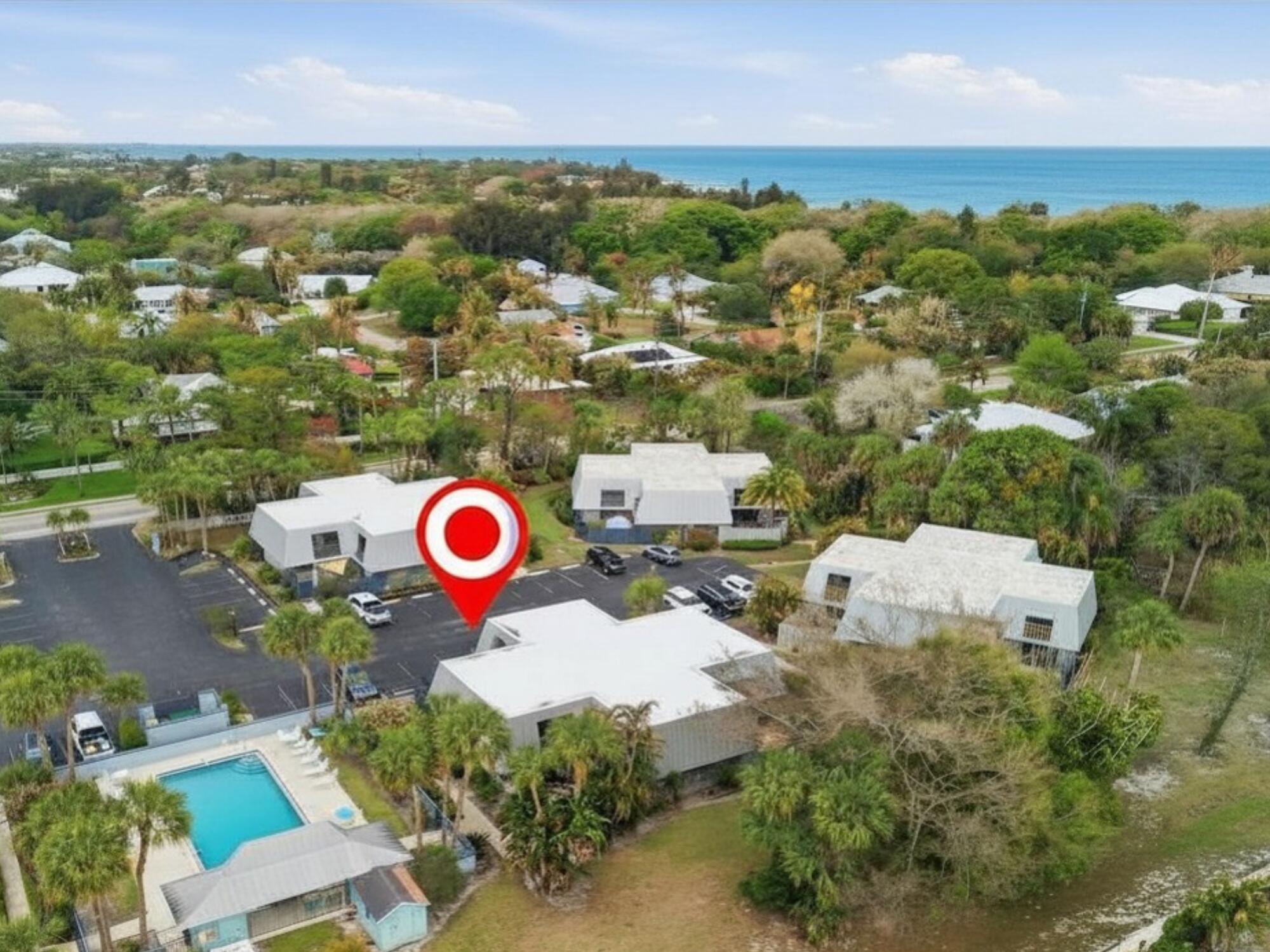 3832 Jefferson Street Stuart, FL 34997 - Photo 22 of 25 an aerial view of a house with a swimming pool