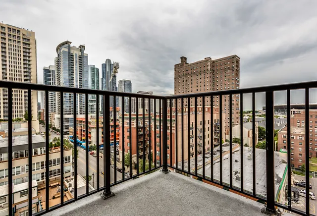 a view of city with tall buildings