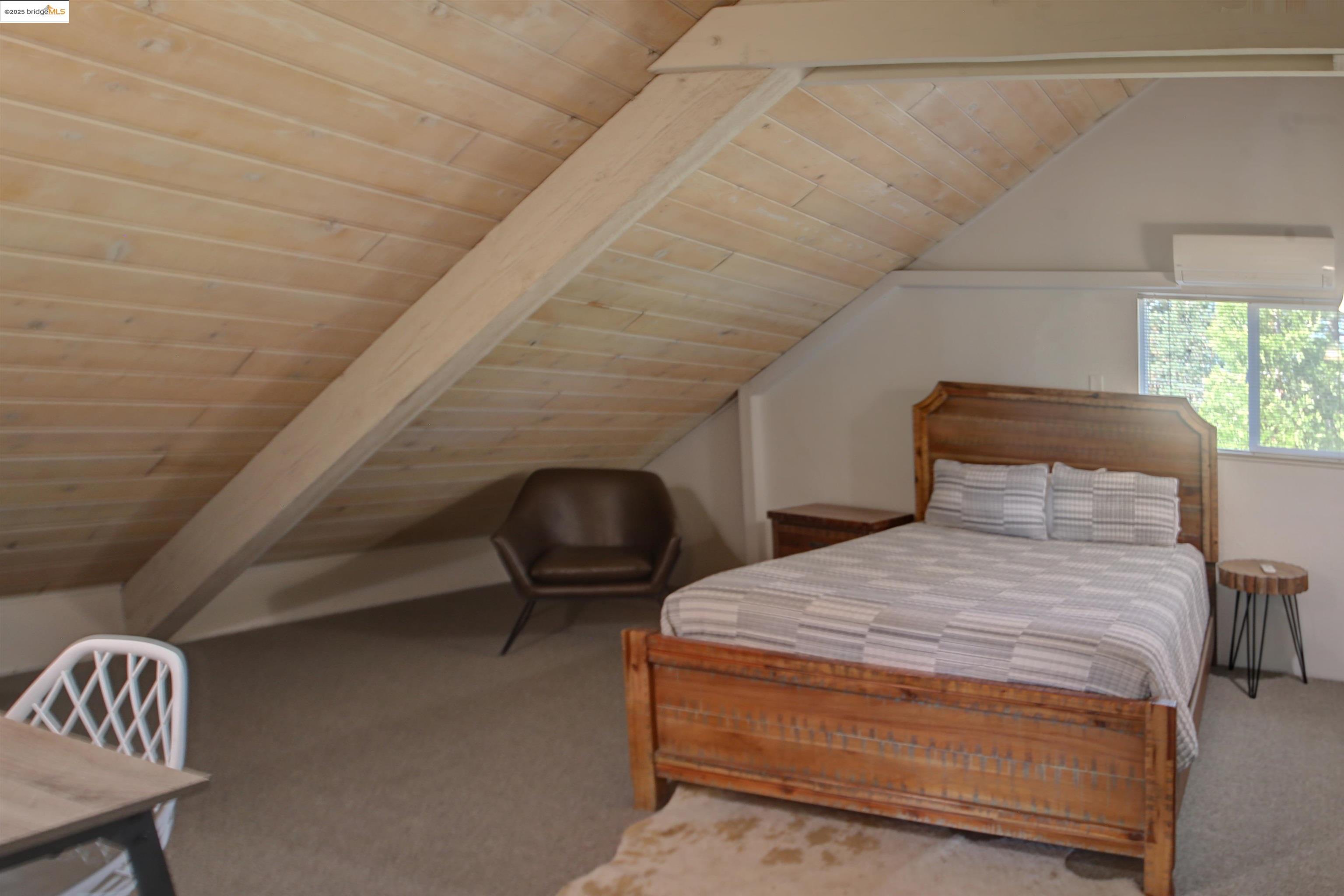 11979 Myer Court Groveland, CA 95321 - Photo 35 of 39 a bedroom with a bed and a chair