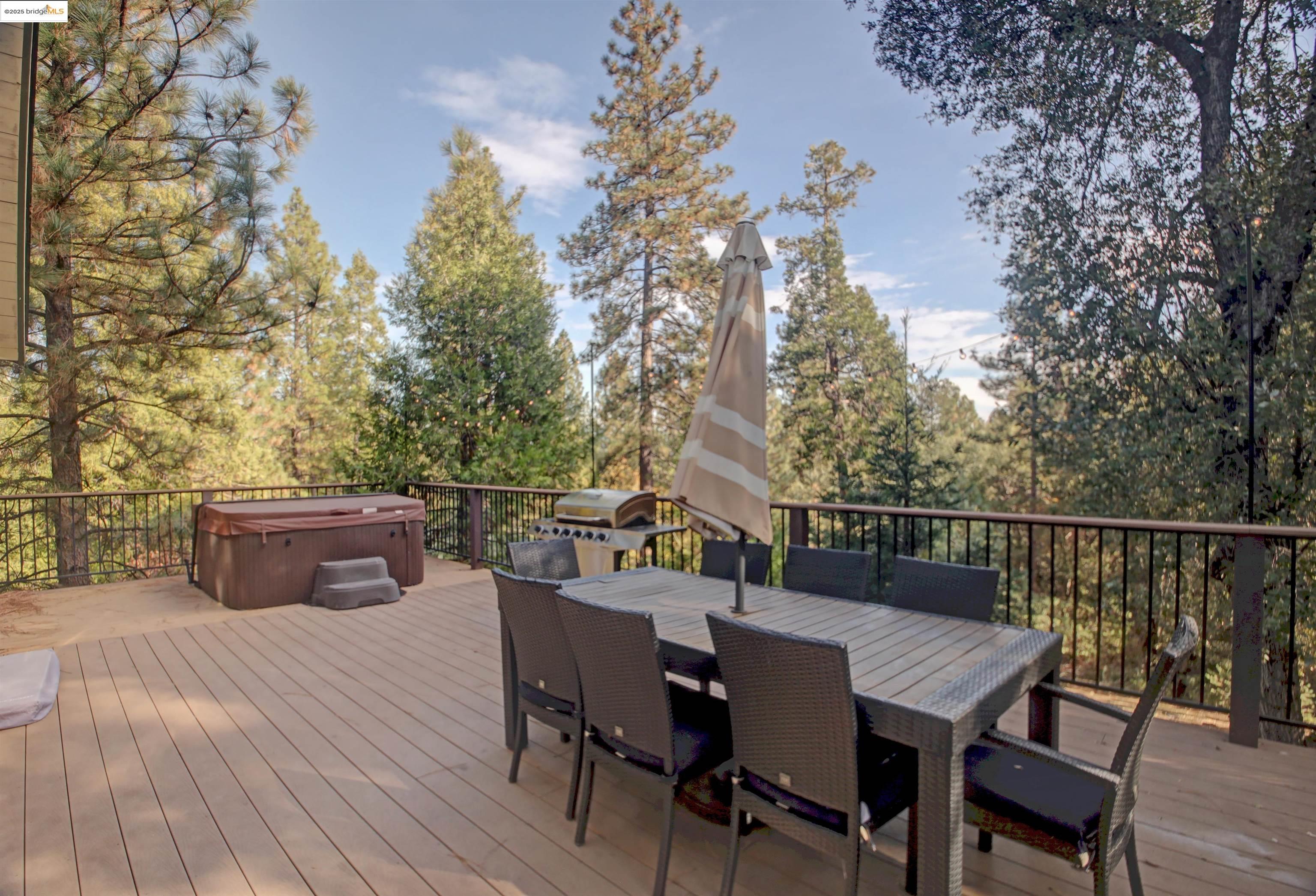 11979 Myer Court Groveland, CA 95321 - Photo 5 of 39 a terrace with wooden floor and outdoor seating