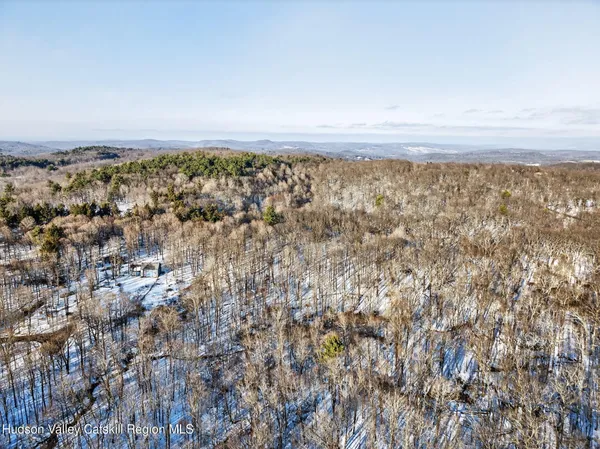 an aerial view of residential building with parking space