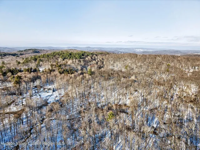 an aerial view of residential building with parking space