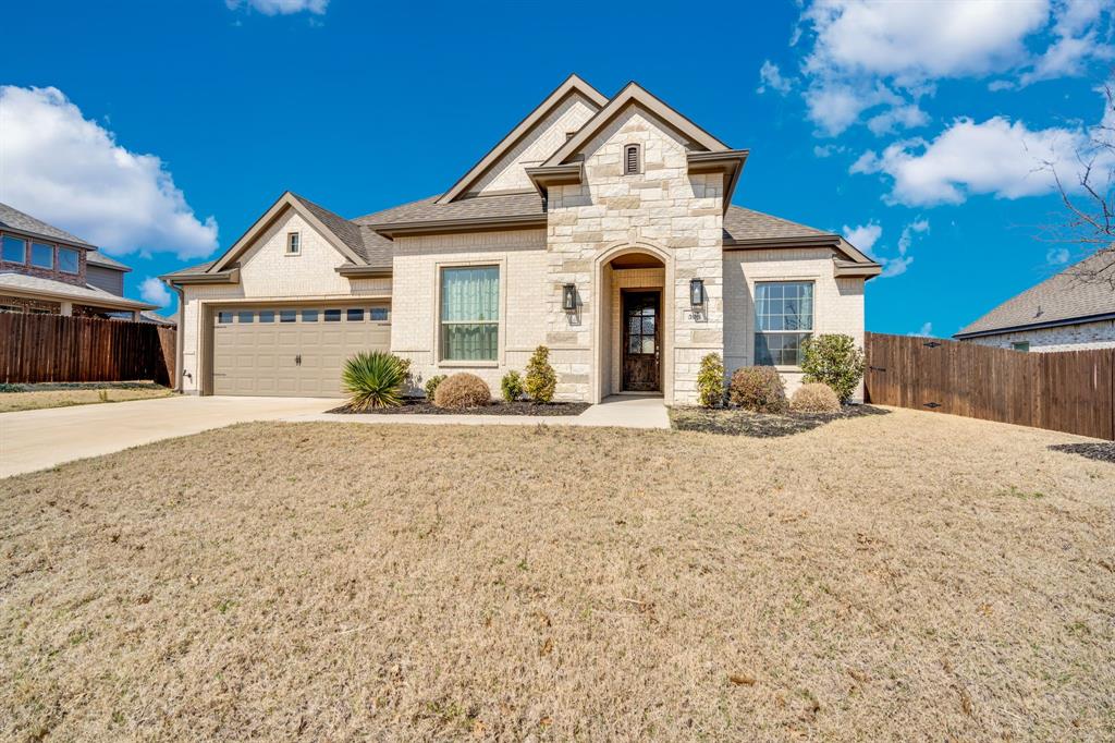 395 Haven Road Waxahachie, TX 75165 - Photo 2 of 40 a front view of a house with a yard