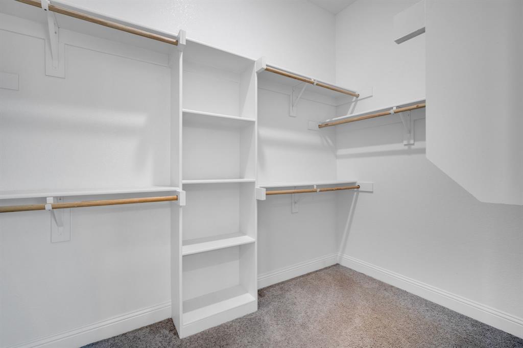 395 Haven Road Waxahachie, TX 75165 - Photo 20 of 40 a view of an empty walk in closet