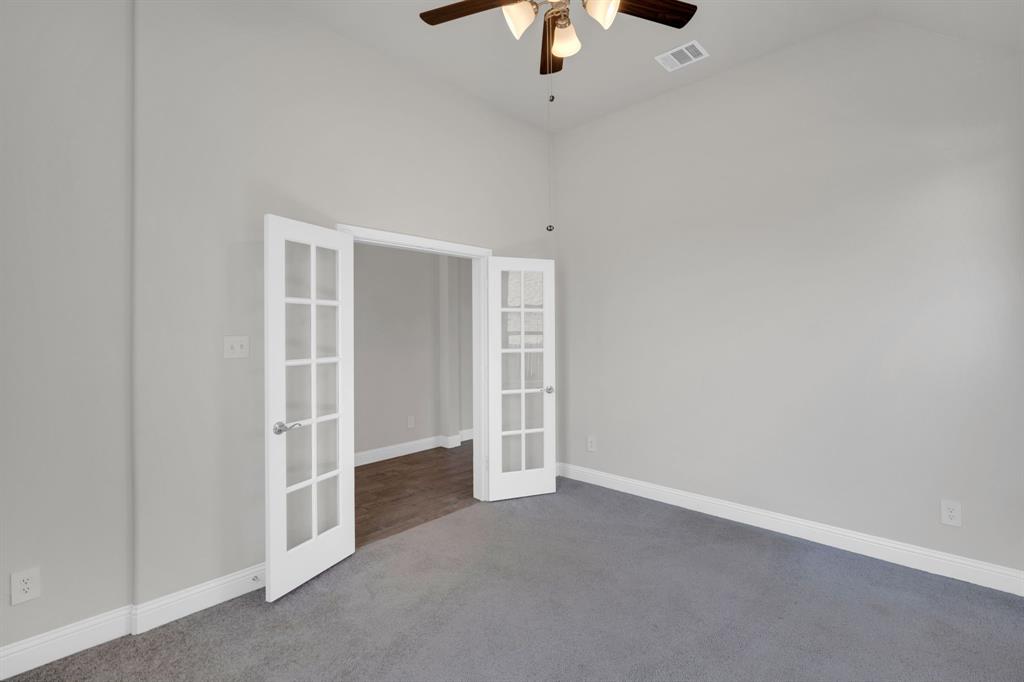 395 Haven Road Waxahachie, TX 75165 - Photo 21 of 40 an empty room with an entryway