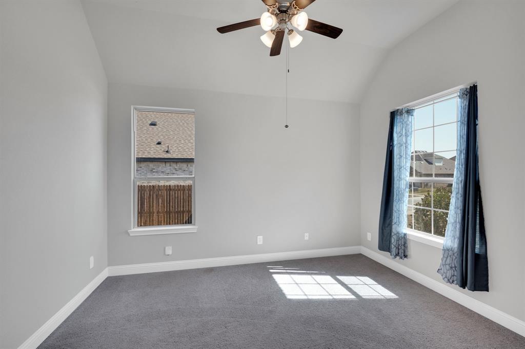 395 Haven Road Waxahachie, TX 75165 - Photo 22 of 40 an empty room with windows