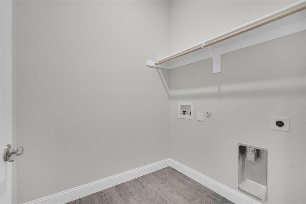 395 Haven Road Waxahachie, TX 75165 - Photo 24 of 40 Laundry room featuring hookup for a dryer, light wood-style flooring, electric dryer hookup, and hookup for a washing machine